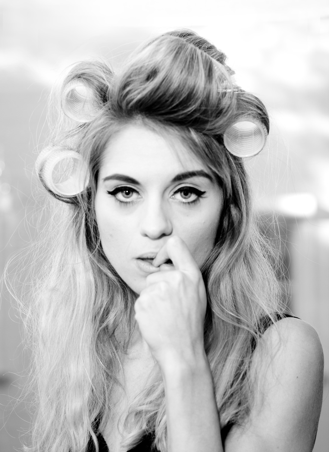 Portrait Frau mit Lockenwicklern